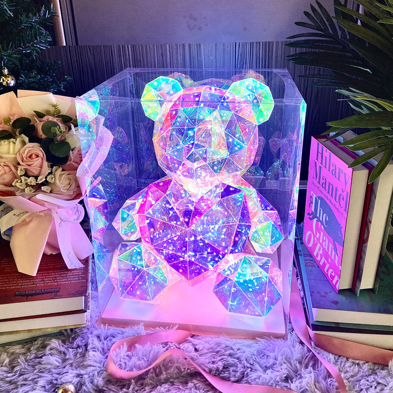 The original cyber galaxy bear with led lights sitting on a table in its gift box