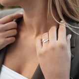 woman displaying hug ring in silver color