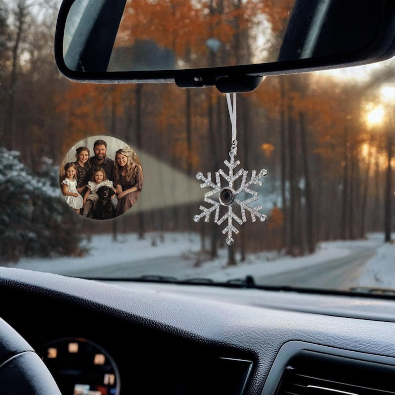 The customisable snowflake christmas ornament hanging on car rear view mirror